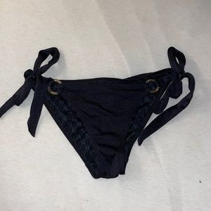Black side Thai Victoria’s Secret bottoms with gold embellishment